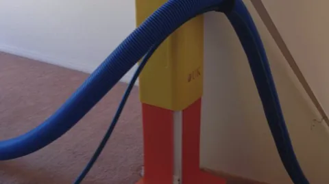 Duk Guard protecting a wall corner from the hose