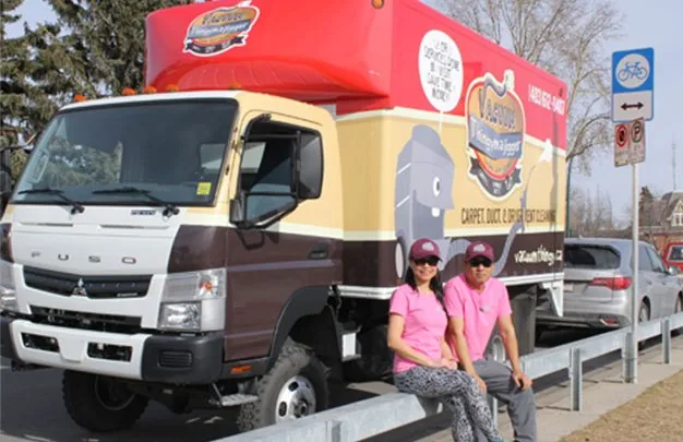 The family with the company truck